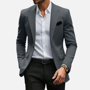 Blazer Masculino Drauffen DF149, confeccionado em poliéster, com gola virada, ajuste solto e fechamento frontal por botões, ideal para um visual sofisticado.