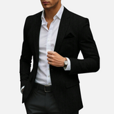 Blazer Masculino Drauffen DF149, confeccionado em poliéster, com gola virada, ajuste solto e fechamento frontal por botões, ideal para um visual sofisticado.